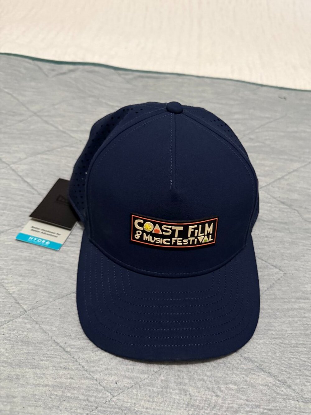 NWT Melin Coast Hydro Performance Hat Navy Blue Laguna Beach Film Festival 58cm